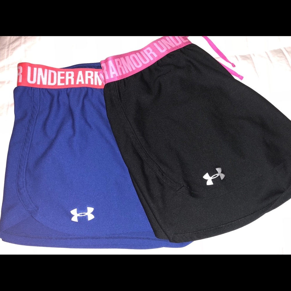 Set of Women’s Under Armour Play Up shorts.